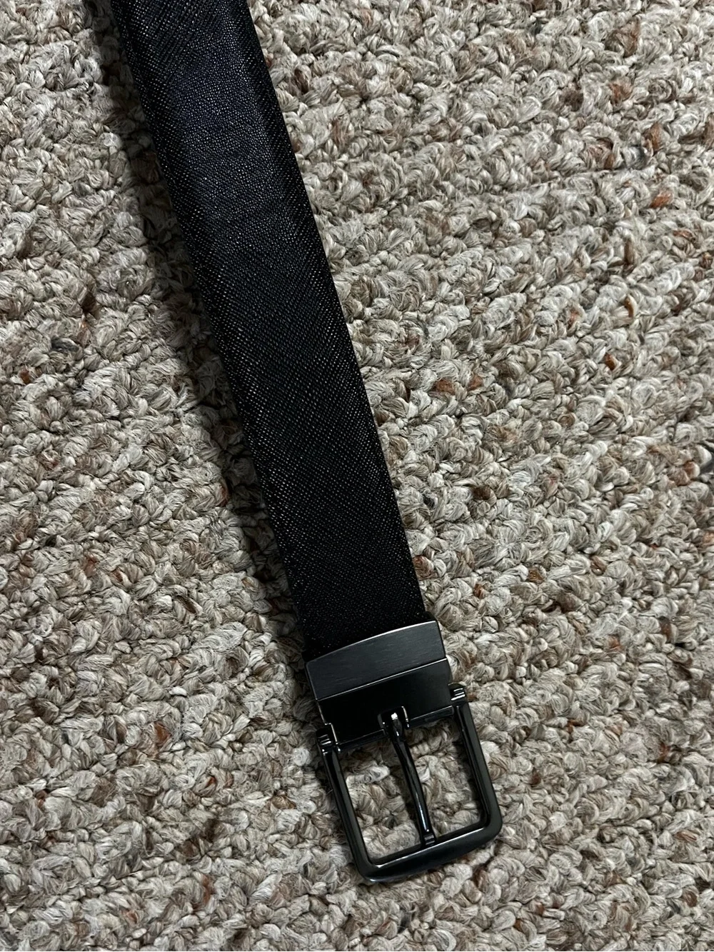 Brown/Black reversible belt. Size small. Heavy gray buckle. Great condition.
